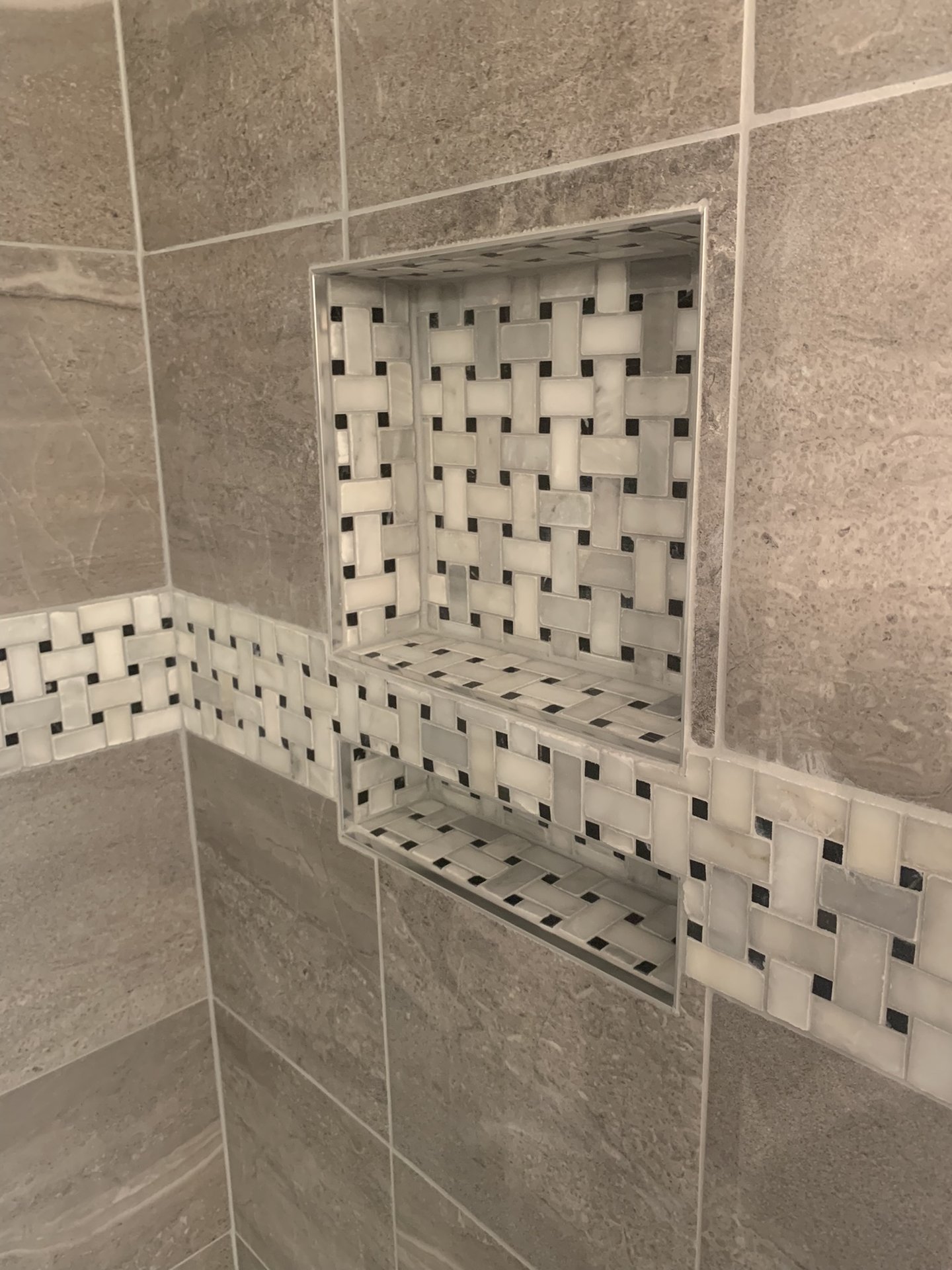 Gray Tile Shower with Basketweave Niche
